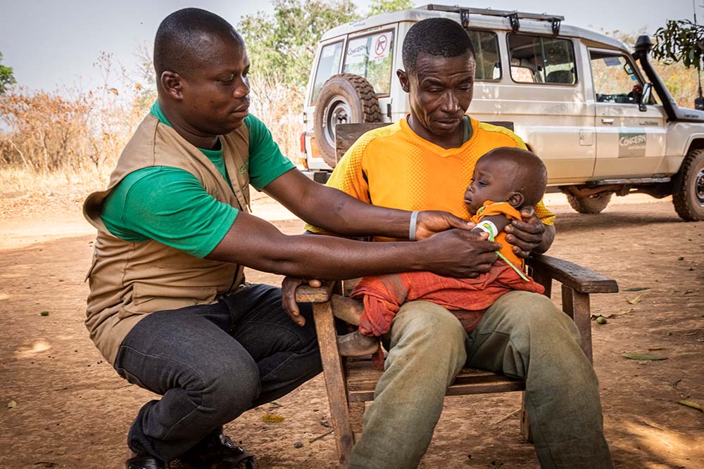 A young child being screened for malnutrition in Central African Republic