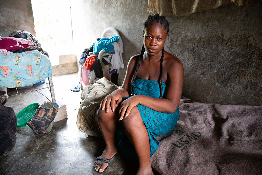 a haitian woman in her home