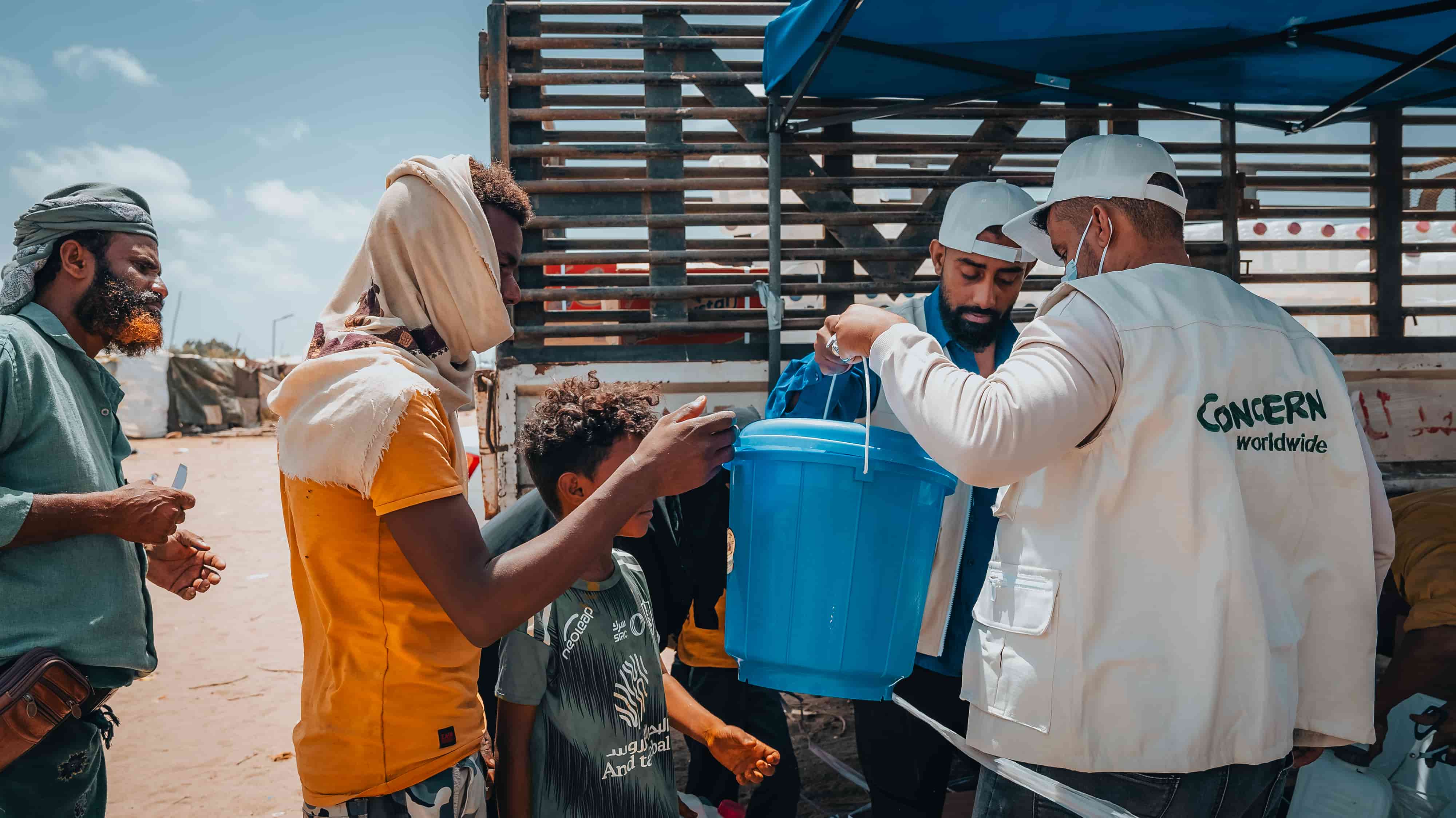 Concern staff in Yemen distribute buckets and hygiene kits to affected families in displacement camps in Yemen.