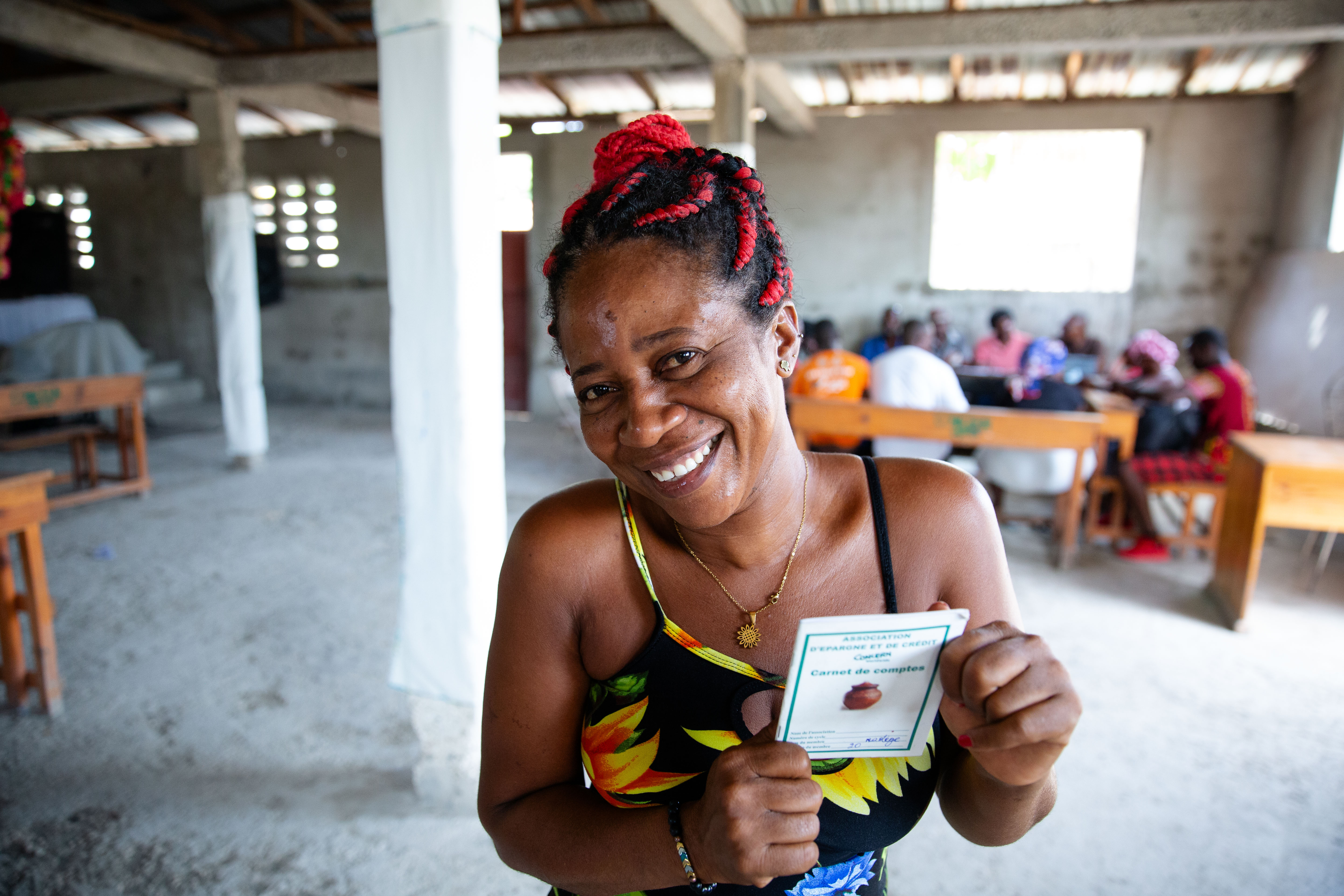 Nadige, a member of a VSLA (village savings and loan) association in her neighborhood in Cité Soleil, Port-au-Prince, Haiti. Photo: Kieran McConville/Concern Worldwide
