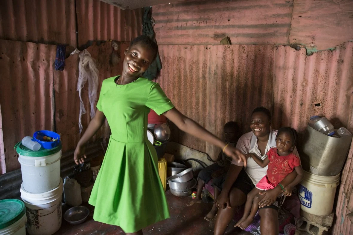 16 year old Émanise models her creations at the family home