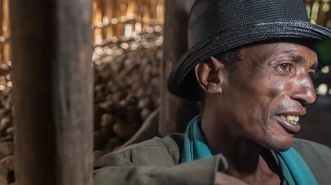 Man in his potato shed