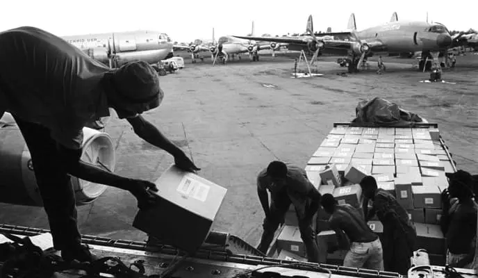 Loading of Joint Church Aid relief supplies on island of Sao Tomé