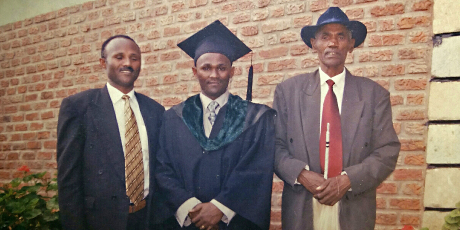 3 men at a graduation