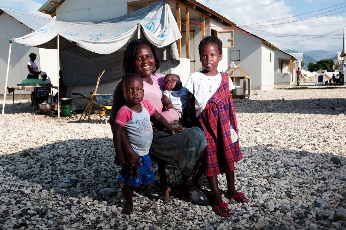Kethlyne St. Previl and her family in Tabarre Issa settlement, October 2010.