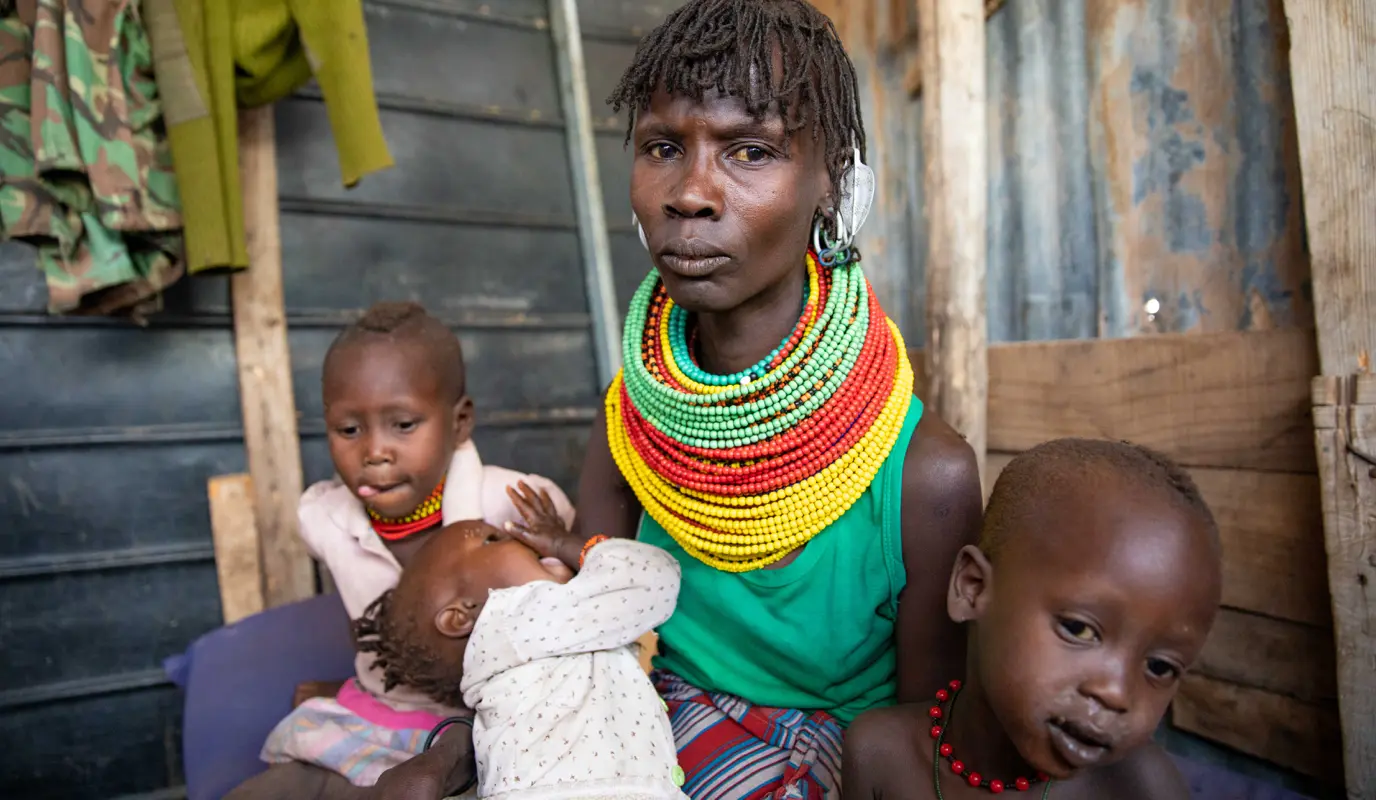 Kenyan mother in drought-plagued Marsabit county with her three children Kenyan mother in drought-plagued Marsabit county with her three children