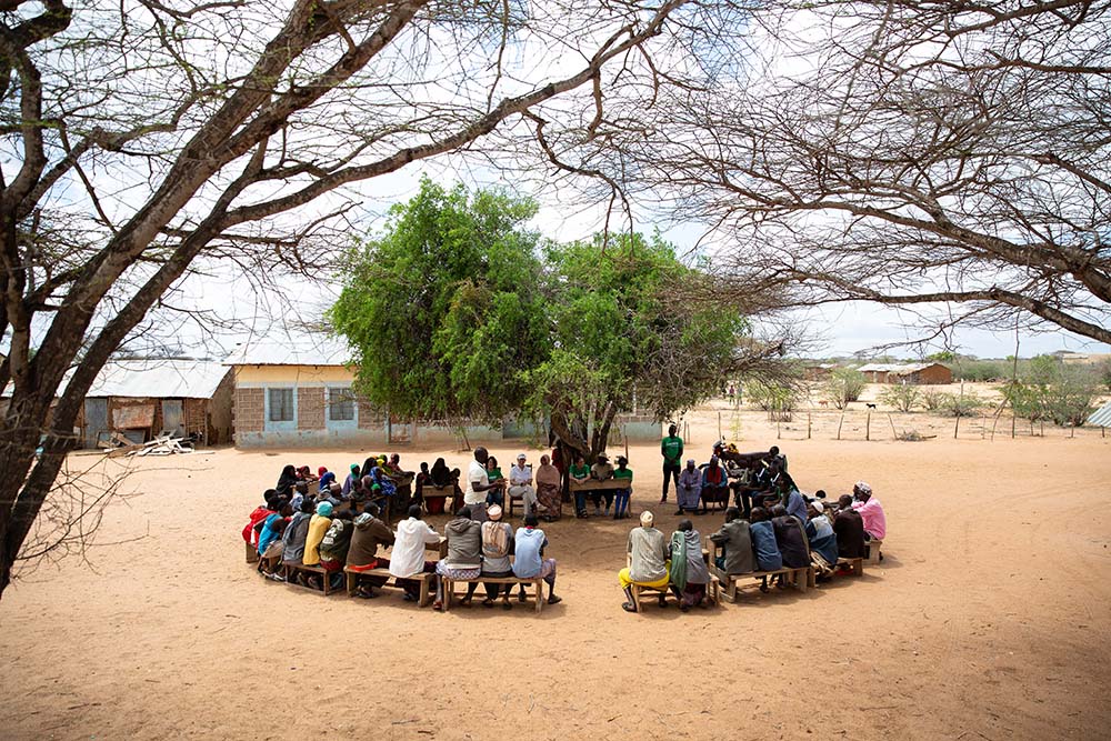 a community meeting in rural kenya