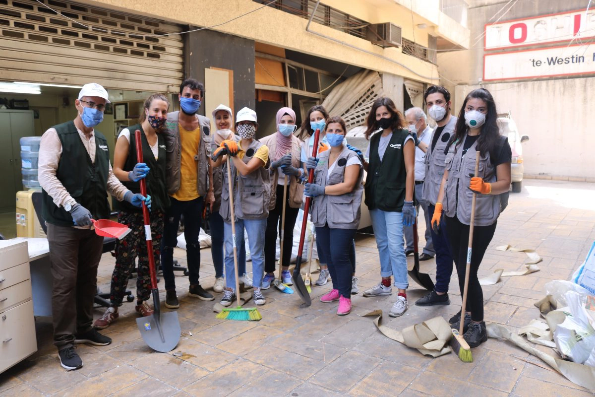 A group of aid workers responding to the explosion in Beirut with cleanup efforts