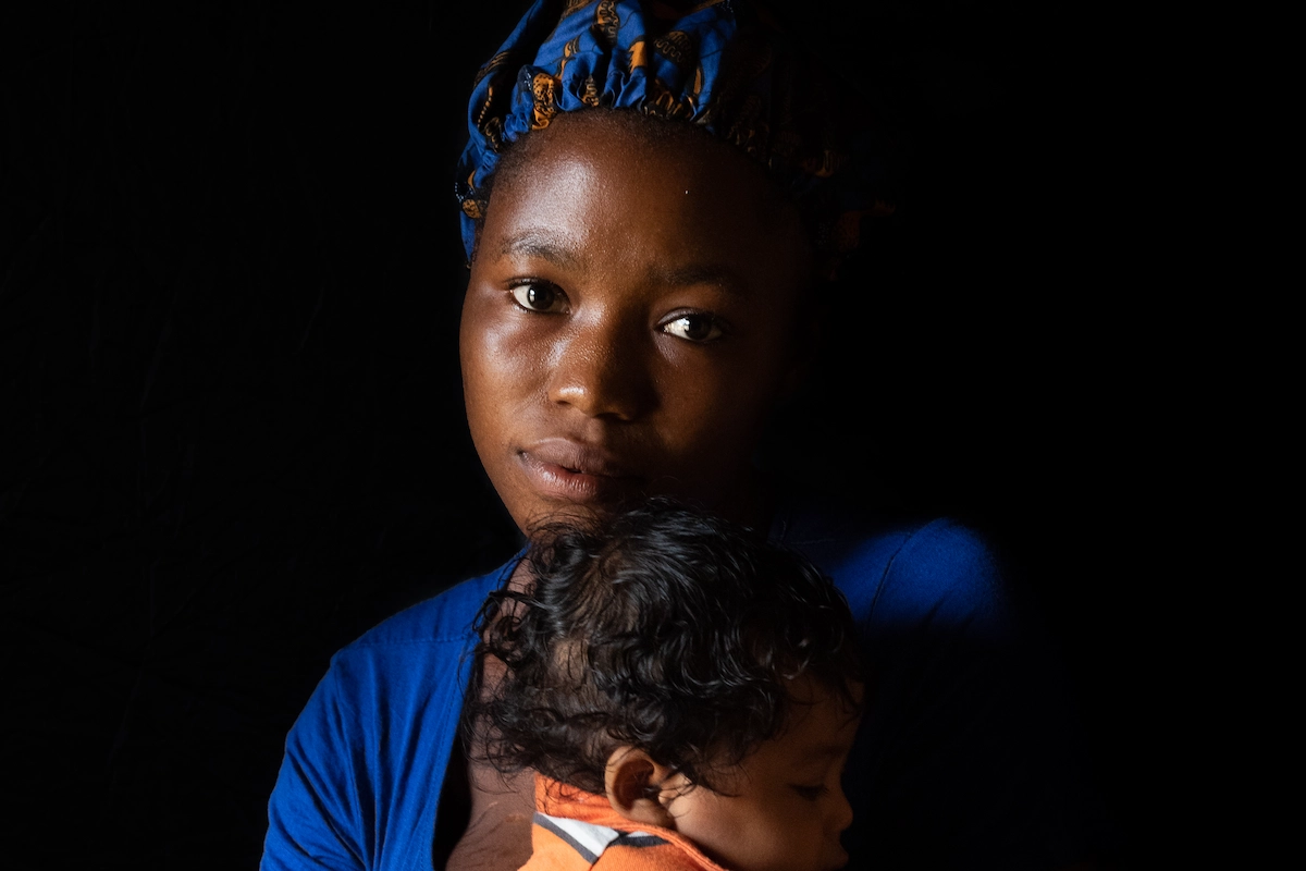 Liberian woman with young child