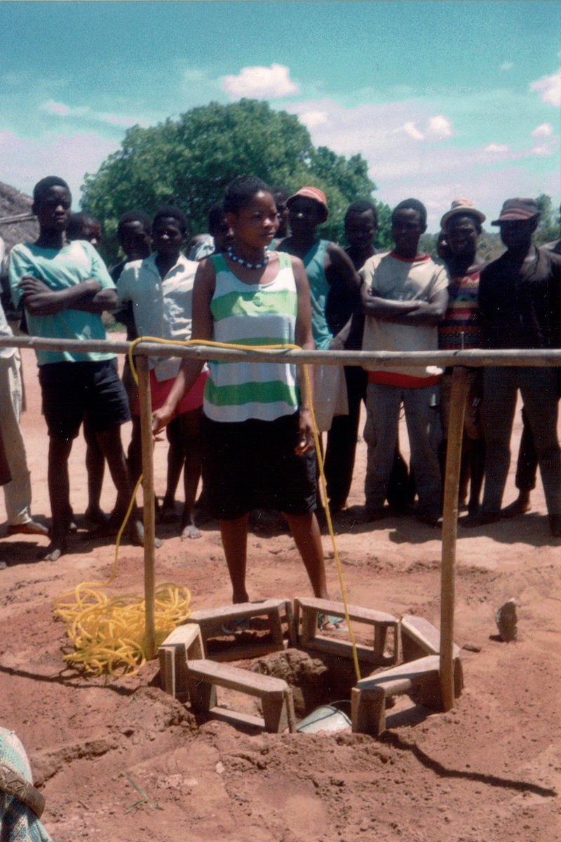 Concern employee Celestine leads a village meeting in Murrupula district, Mozambique (1995)