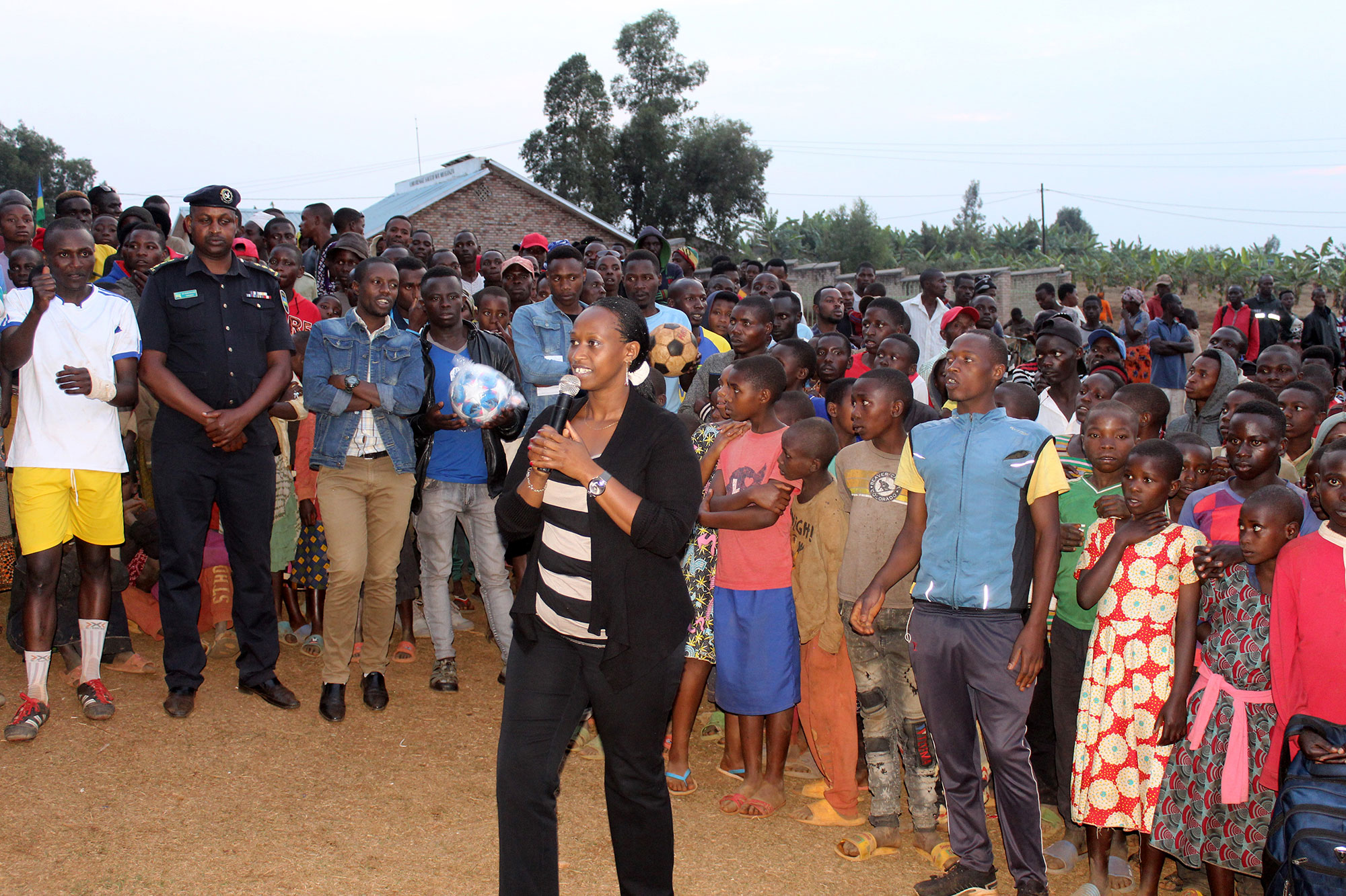 Denise Dusabe, Vice Mayor of Social Affairs in Gisagara district, presents at an HIV/AIDS prevention event organized by Concern Rwanda.