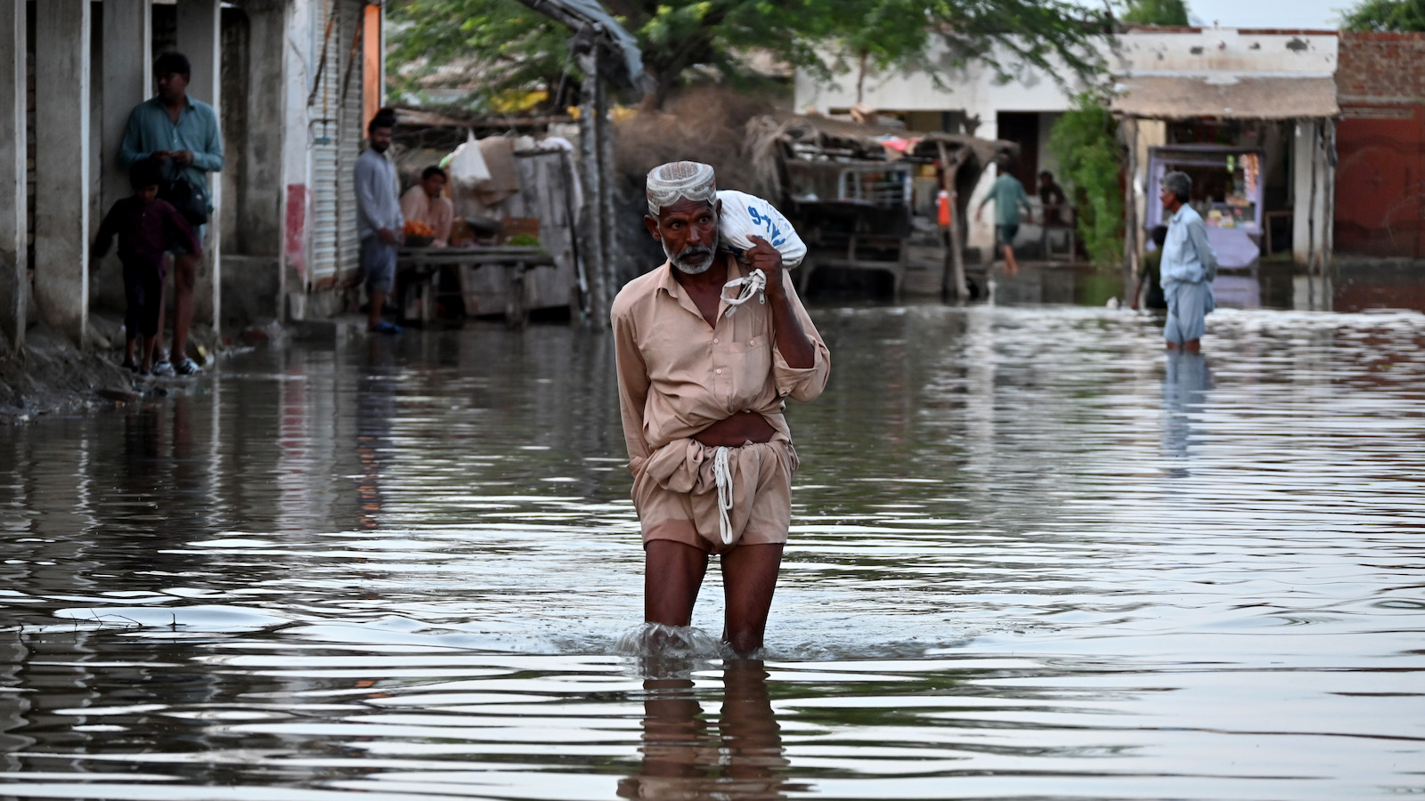 People going to their village to check the situation near Sanjar Chang town in Sindh, Pakistan during the 2022 floods. (Photo: Emmanuel Guddo/Concern Worldwide)
