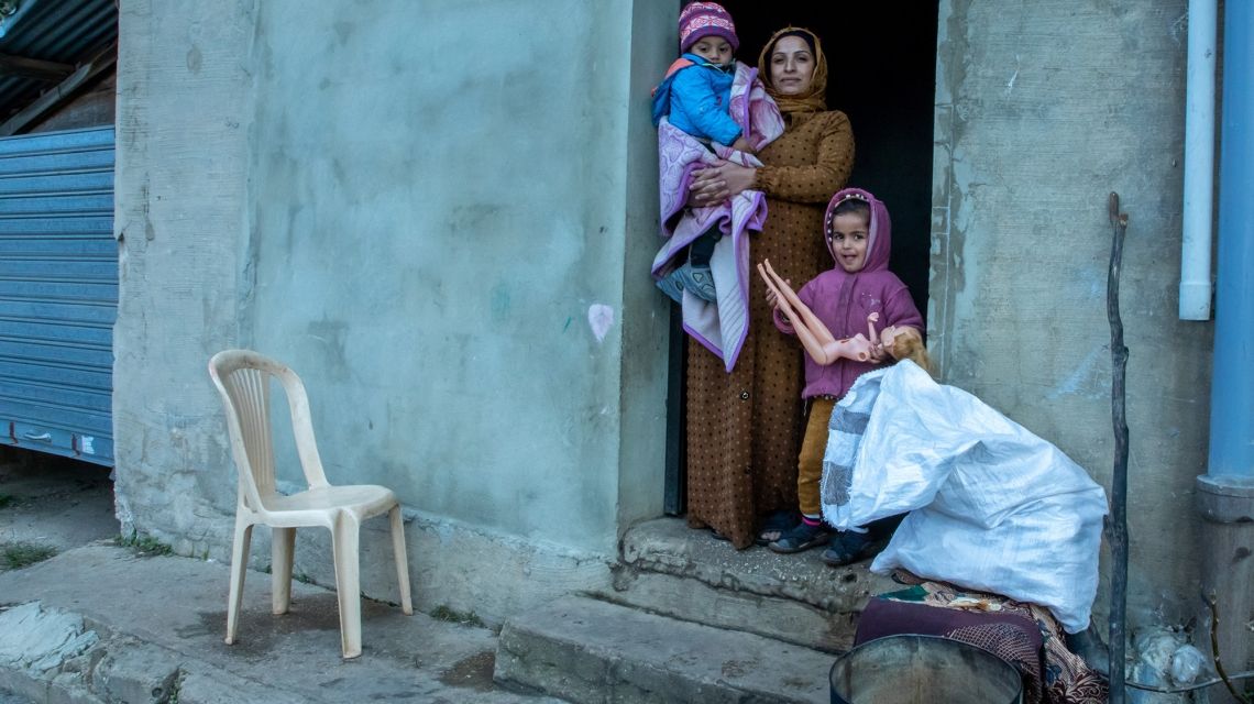 Syrian refugee Maram* struggles to keep her children warm in a brutal Lebanon winter. (Photo: Gavin Douglas/Concern Worldwide)
