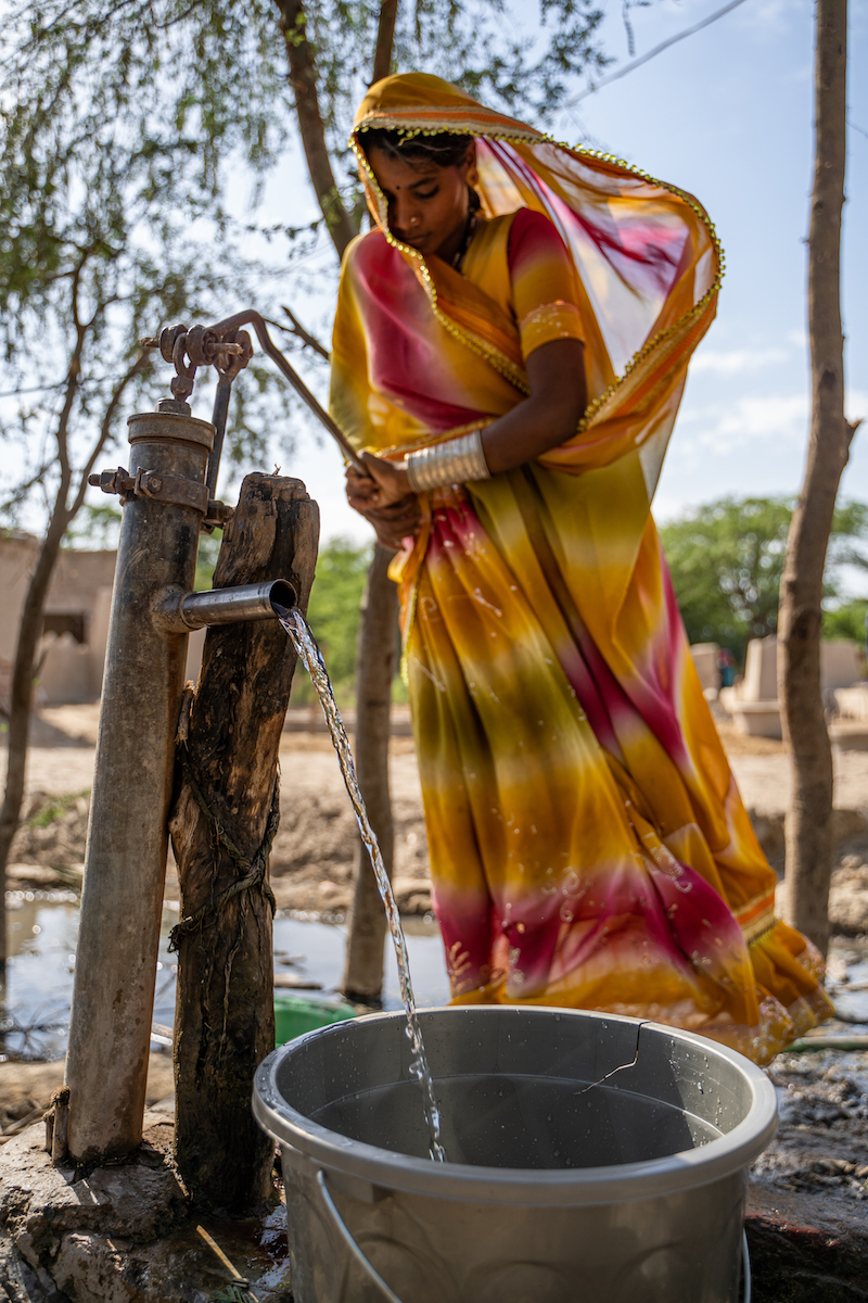 Neelam filters water in Village Haji Muhammad in Pakistan's Umerkot district