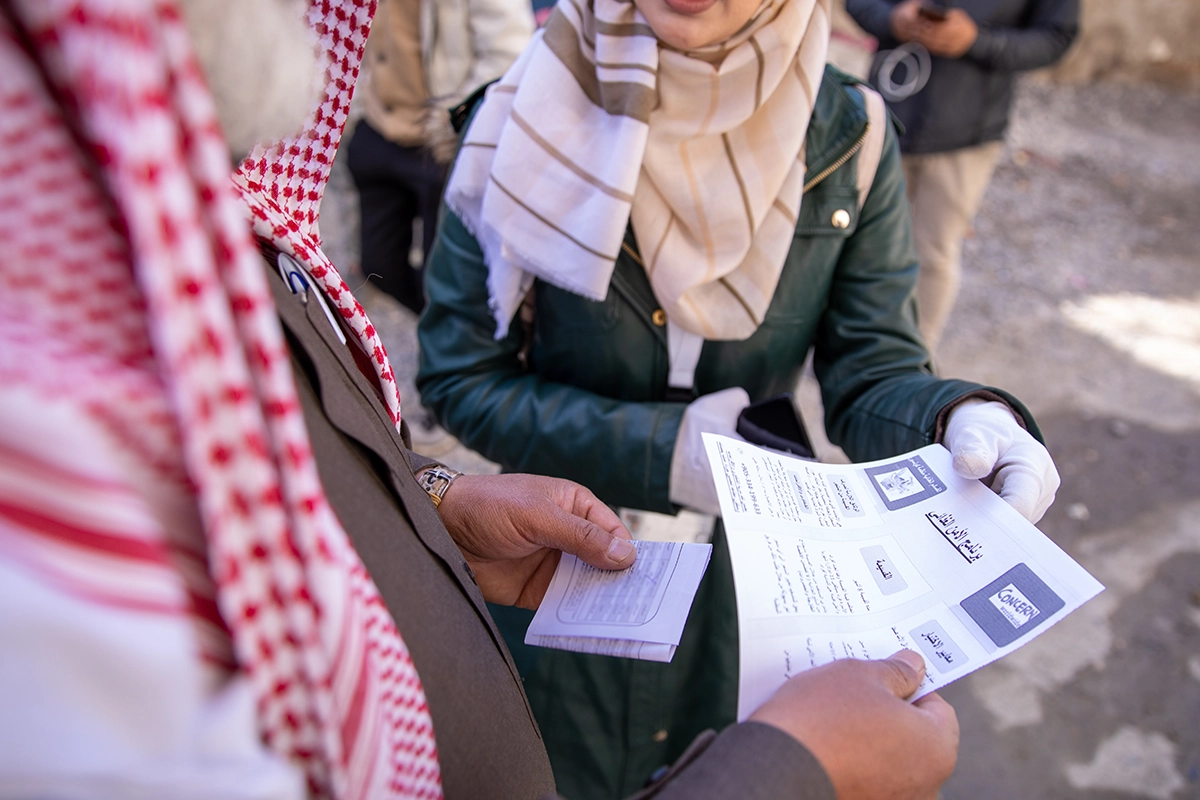 A Concern-led cash voucher distribution in northern Syria gives participants the chance to support local businesses, while getting the items they need despite challenges like limited work and high rates of inflation. (Photo: Concern Worldwide)