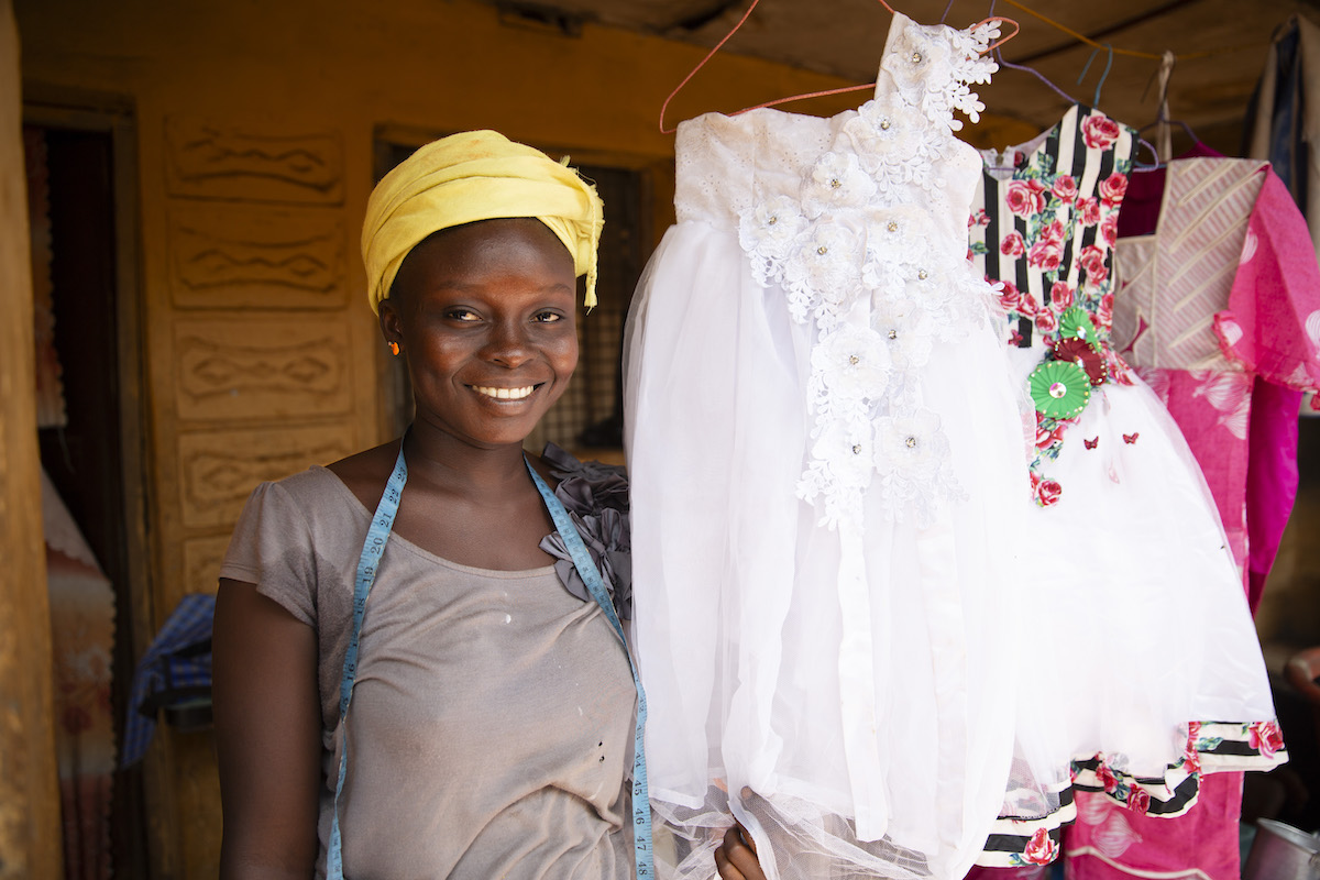 Hawa Sesay, a participant in the Concern-run EAGER program in Freetown, Sierra Leone, which was designed to support out-of-school girls. She now has her own tailoring business. Photo: Kieran McConville/Concern Worldwide