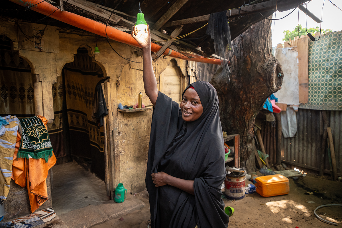 Idil* a mother of seven children, sells clothes and shoes in Wadajir district. Through a self-help group, she was able to enrol in various training programmes for business and household management, including improving how to solve household issues as a couple. The business training taught her how to read and write, as well as how to do maths and calculate her earnings. (Photo: Mustafa Saeed/Concern Worldwide)