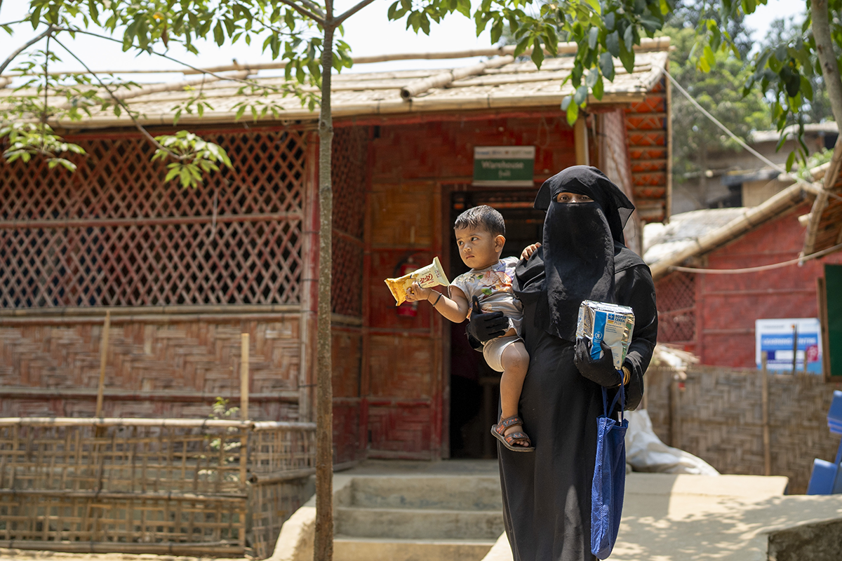 Anowara* and her husband have four children, three daughters and one son. Anowara visits the Concern nutrition centre at Camp 19, Rohingya camp, Ukhiya, Cox's Bazar. Their youngest is Mohammad Rayhan* who is 17 months. Mohammad Rayhan received RUTF for malnutrition at 7 months old (for 3 months). The four children now receive Super Cereal but are well. Photo: Saikat Mojumder/Concern Worldwide