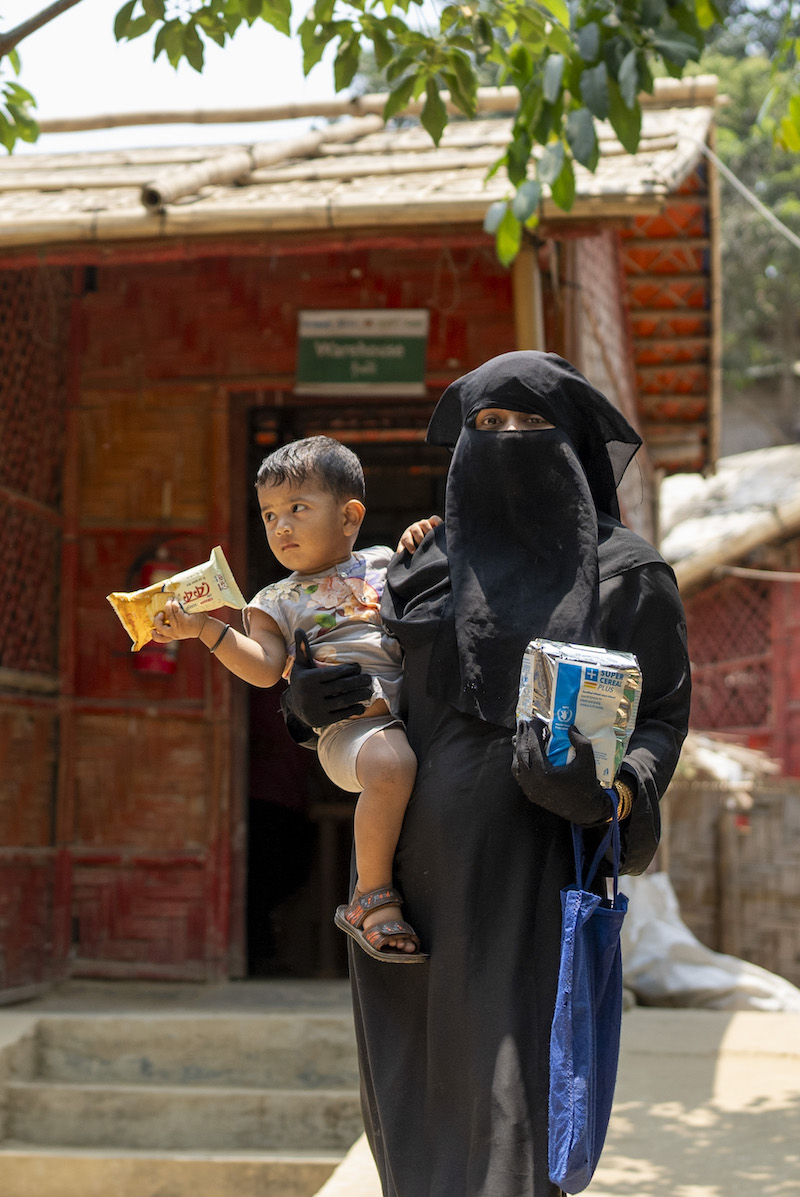 Anowara* visits the Concern nutrition center at Rohingya Camp 19, Cox's Bazar, with her youngest child. (Photos: Saikat Mojumder/Concern Worldwide)
