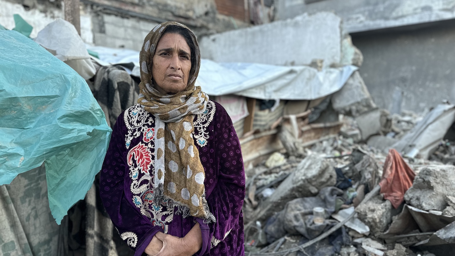 Manila* and her family were displaced to Rafah then to Al-Nuseirat. They are suffering from hunger and thirst. They have no tents, food or water. "Life is harsh and full of suffering." Photo: Khalil Adwan