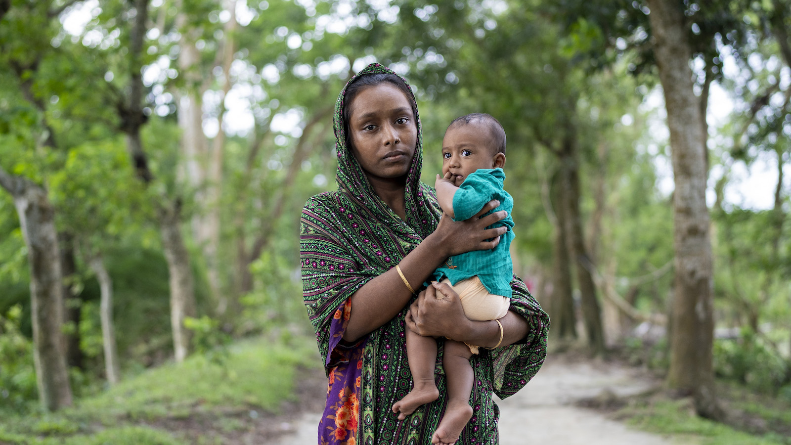 Iti Moni (17) with her seven-month-old son Abdullah, married at the age of 16 and was unable to continue her high school education. Struggling with poverty, she now faces malnutrition and has difficulty providing the essential care her baby needs for healthy growth. Photo: Saikat Mojumder/Concern Worldwide