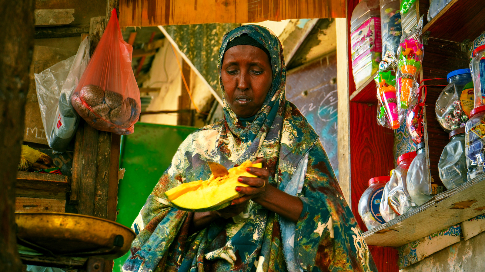 Surad* (55) runs her own shop in Bondhere district in Mogadishu. Concern’s Self-Help Group (SHG) model gave Surad* the support and skills she needed to begin her own business. The SHG programme first helps women individually, teaching them essential skills like business development. Photo: Adnan Mohamed/Concern Worldwide