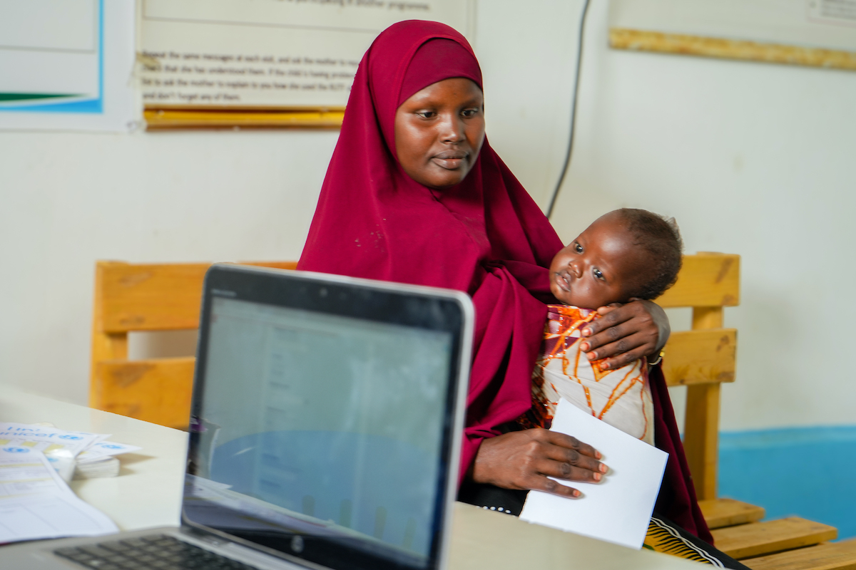 Ayan* (26) is a mother of five children from the outskirts of Baidoa, now living in a displacement camp in Daynile District, Mogadishu. She attends the Concern-supported Siinkadheer Health Facility with her youngest. (Photo: Adnan Mohamed/Concern Worldwide)