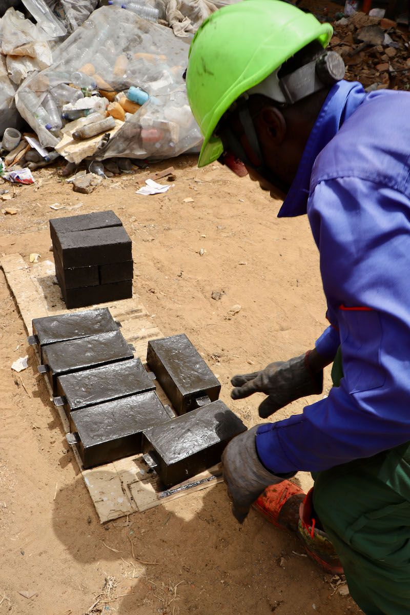 Concern worked with a local Chadian company, Karö Enterprise, to collect over 59kg of packaging (approx. 12,800 empty packages) to recycle into 600 bricks and paving stones for use in construction. (Photos: Pierre Maget/Concern Worldwide)