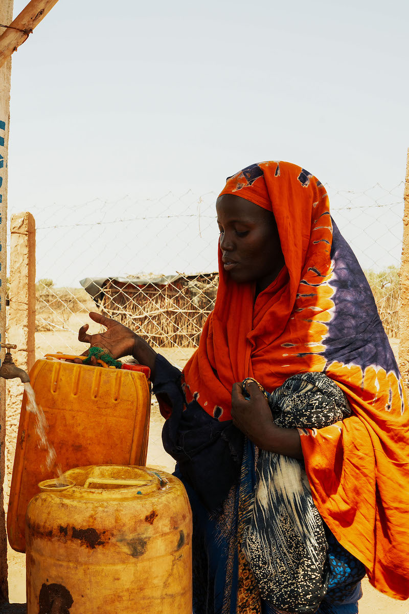 Binta Feriahmed washes up at a water point set up in the Somali region of Ethiopia as part of Concern's Hanaano program, funded by Irish Aid. The program addresses the crisis of malnutrition and related issues in the Horn of Africa. (Photo: Adnan Ahmed/Concern Worldwide)