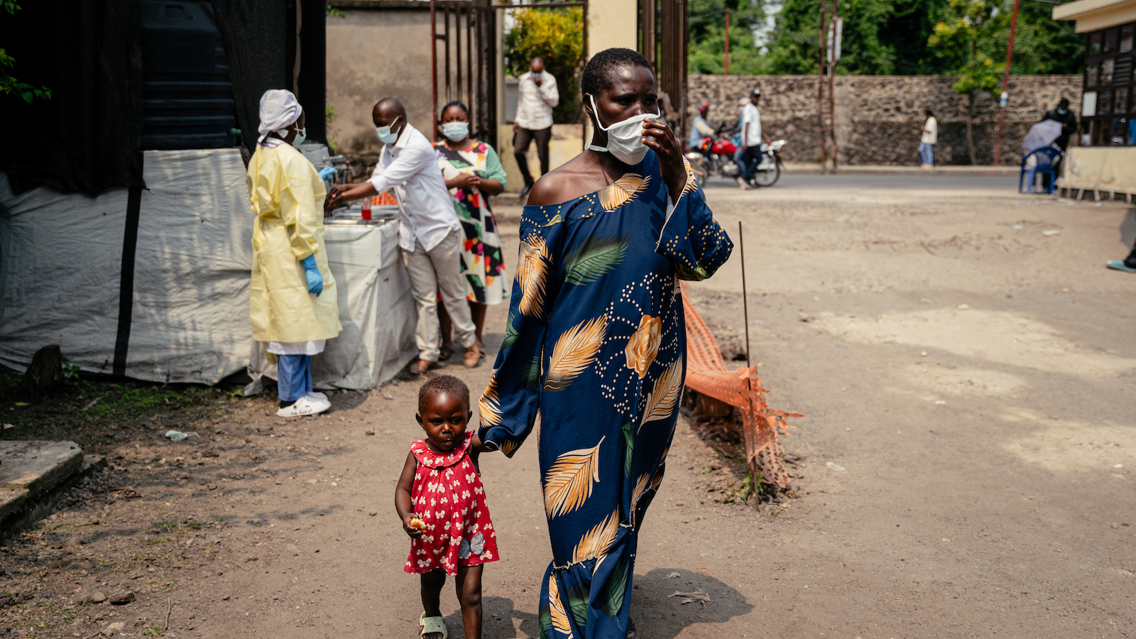 A woman wearing a mask as a preventive measure enters Kyeshero Hospital after passing a checkpoint for hand washing and health screening in Goma. Photo: Getty Images