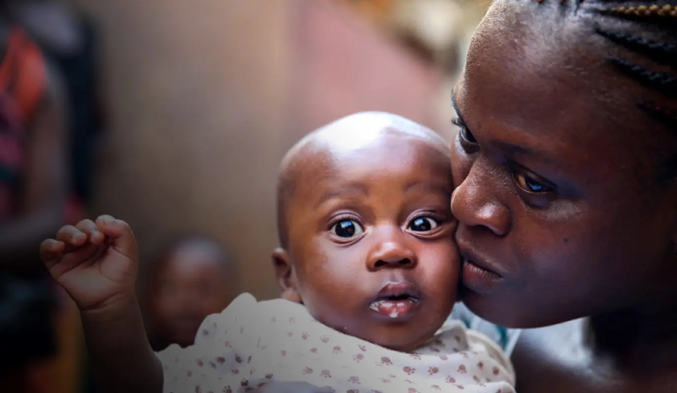 Yeanor Tabeh-Conteh and her four-month-old son, Abdulla, in their hometown of Sumaila, Sierra Leone.