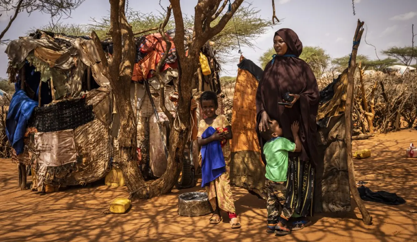 Nimco with two of her six children.