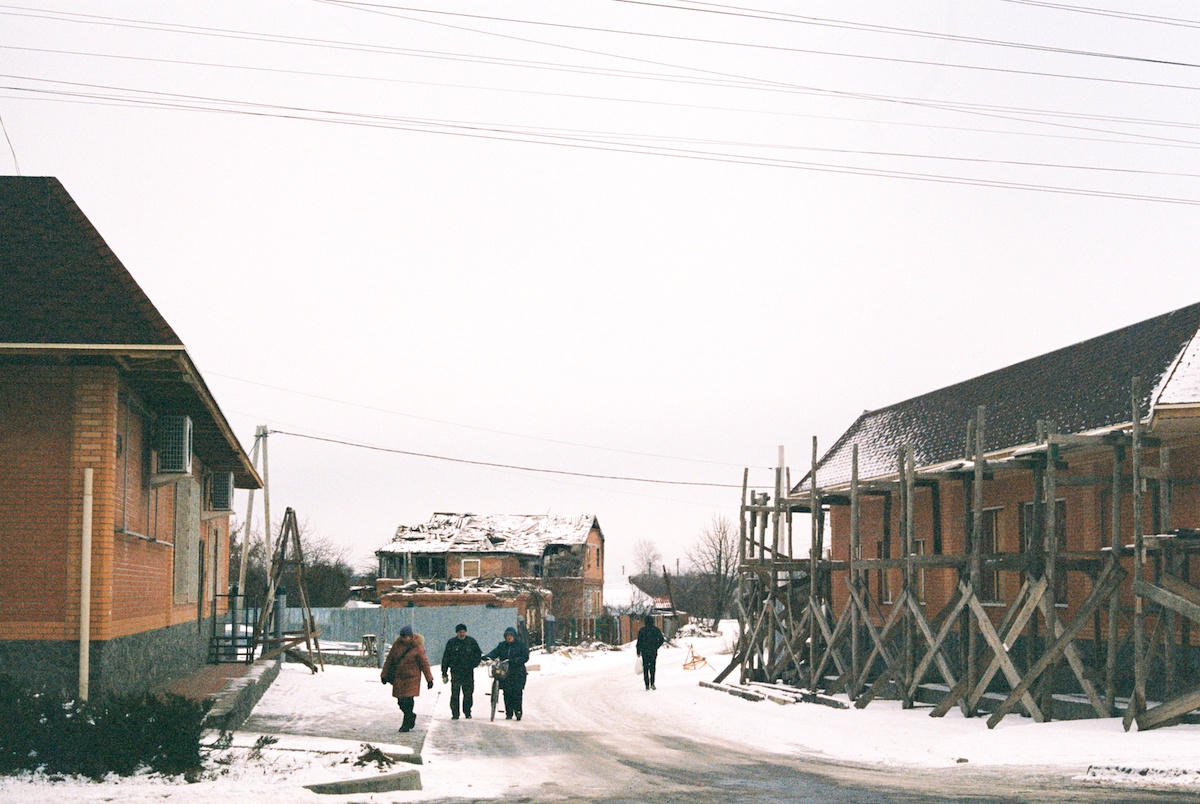 Locals walk through Okthyrka, a city in Ukraine's Sumy oblast that sits on the frontlines of conflict. (Photo: Olivia Marlowe/Concern Worldwide)