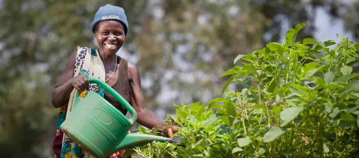 Woman watering her garden