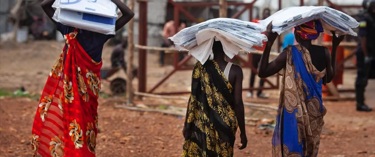 Women walking toward their village