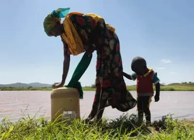 Woman collecting water